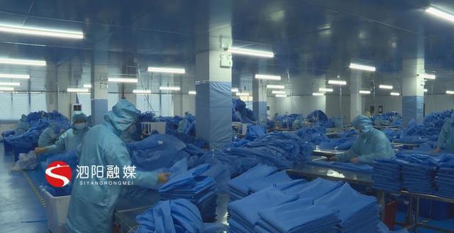 九州酷游铭泰医疗用品：日产2万件防护服隔离衣保障防控物资供给(图1)